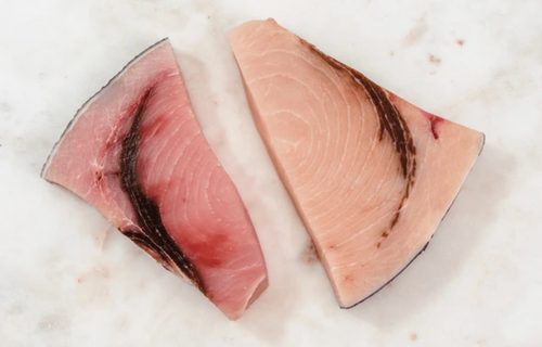 Fresh 6-oz wild-caught swordfish steak on display, ready to cook