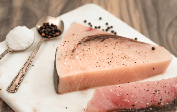 Raw swordfish steak fillet, perfect for grilling or searing